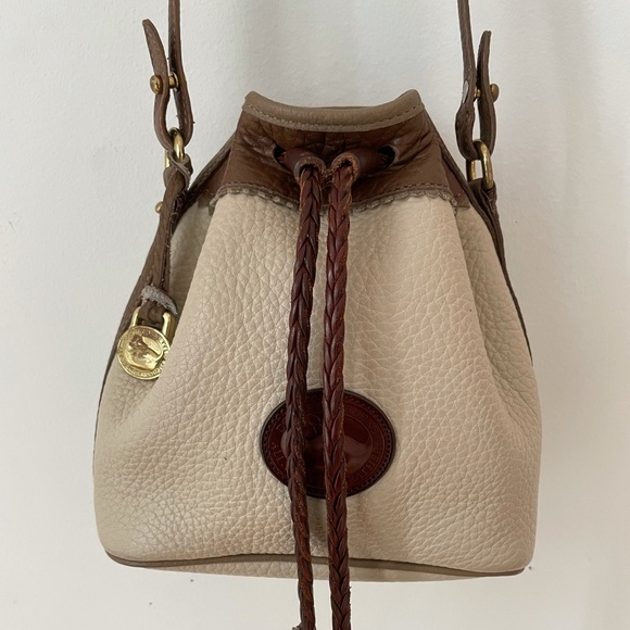 Dooney & Bourke Teton Drawstring AWL Crossbody - Picture 1 of 9